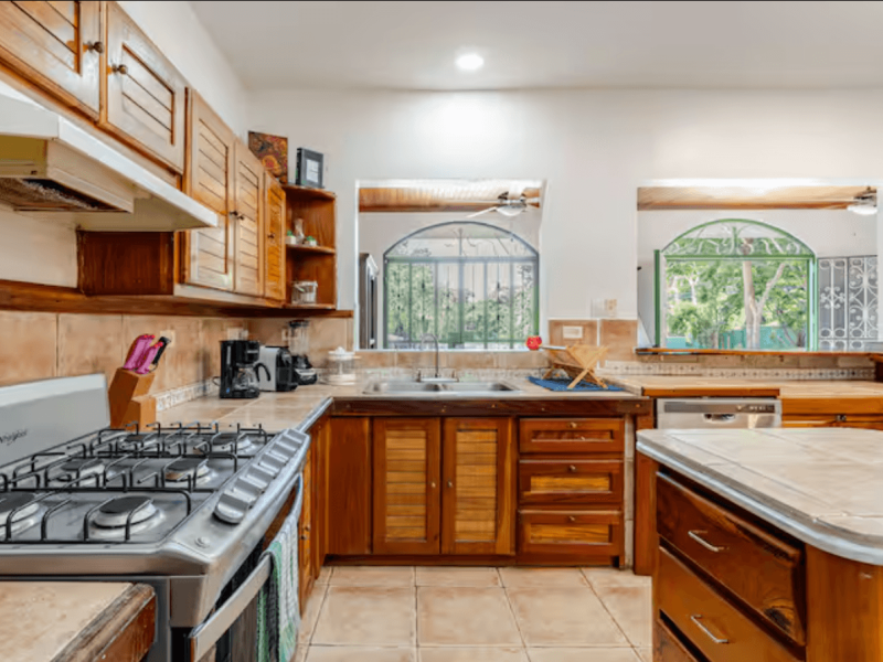 Fully equipped kitchen with quality cookware, spacious storage, and all the essentials to prepare family meals after a day of adventure in Guanacaste.